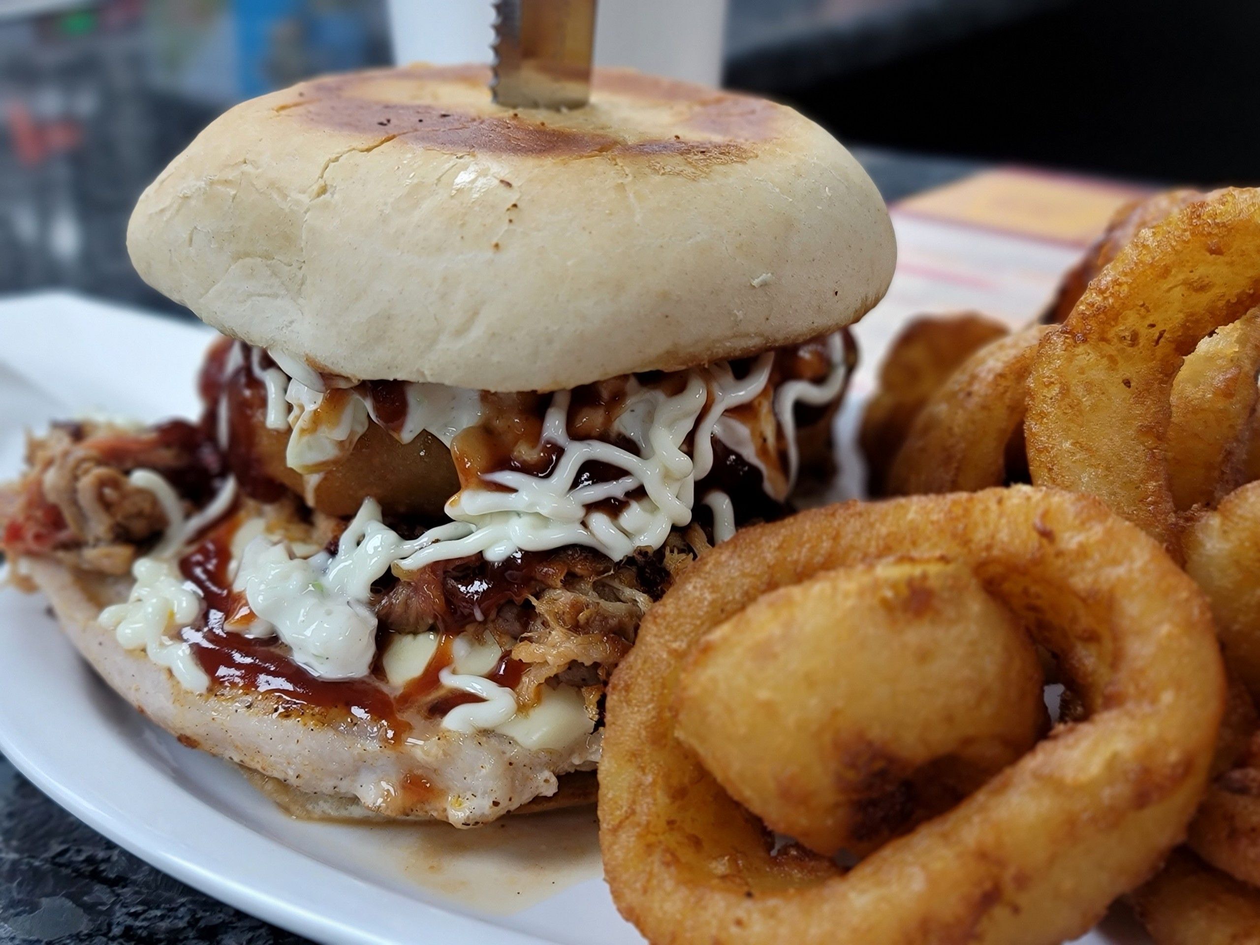 BBQ Pulled Pork Sandwich with Onion Rings